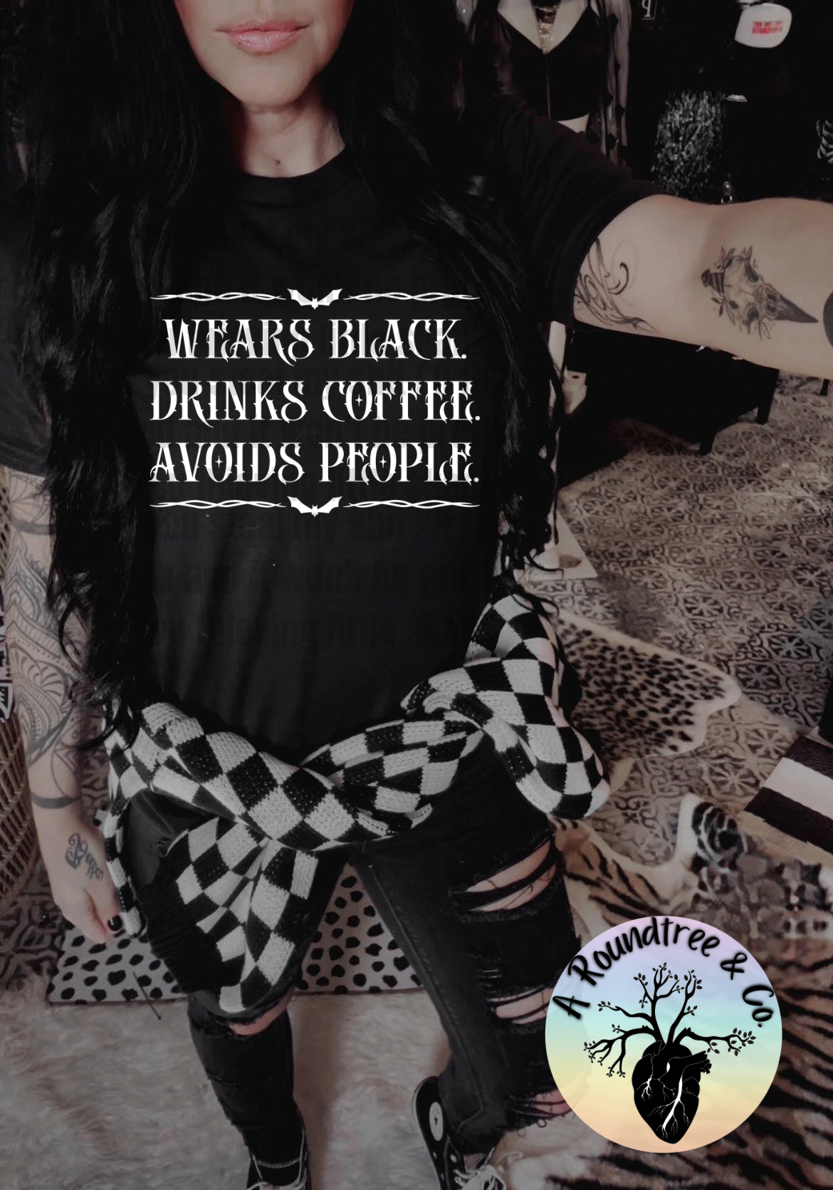 Wears Black, Drinks Coffee, Avoids People